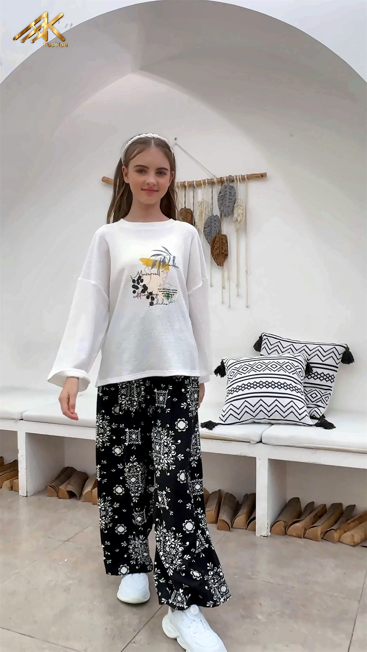 Graphic sweatshirt with floral print trousers
