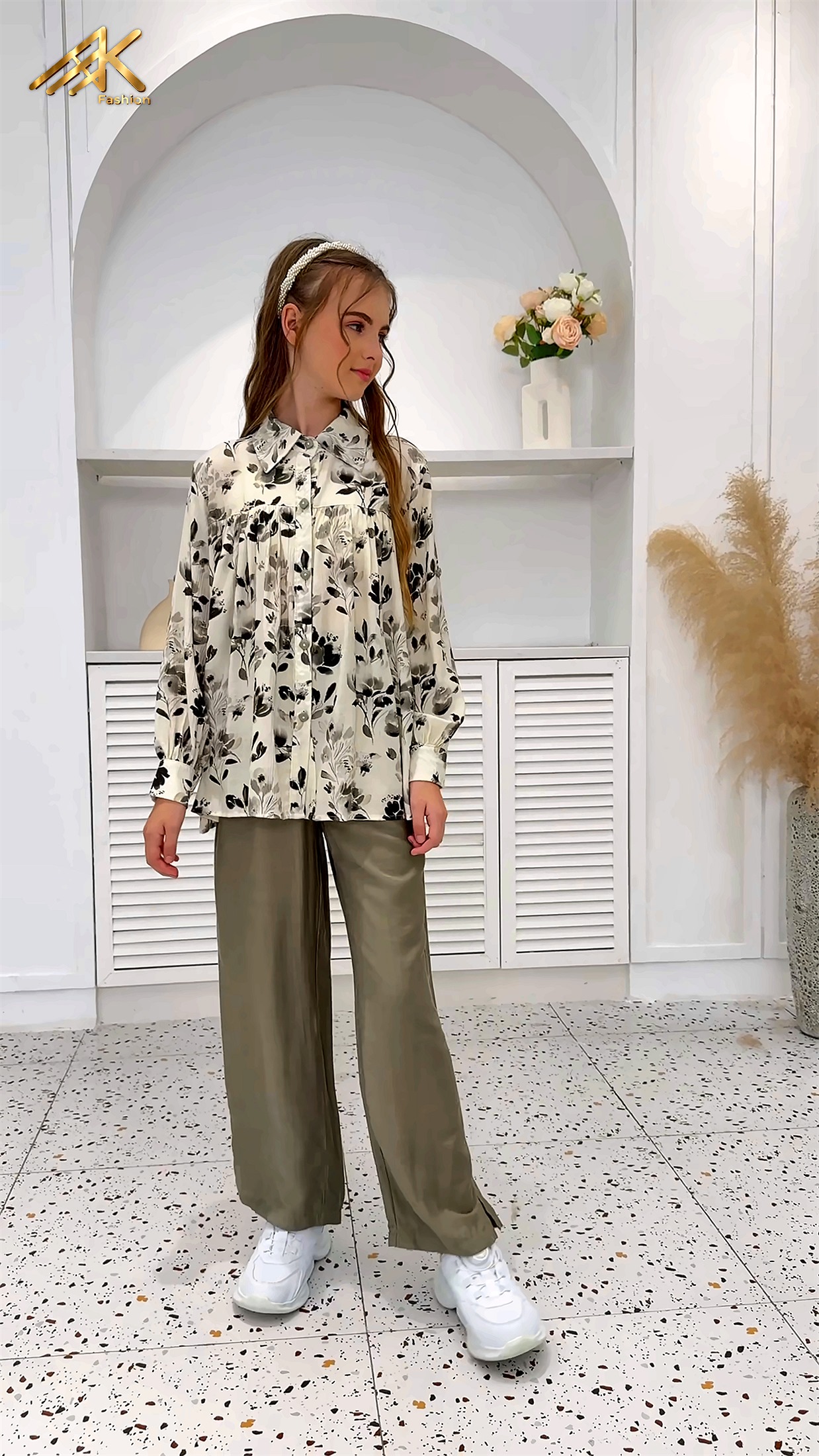 Floral print blouse with olive wide-leg trousers