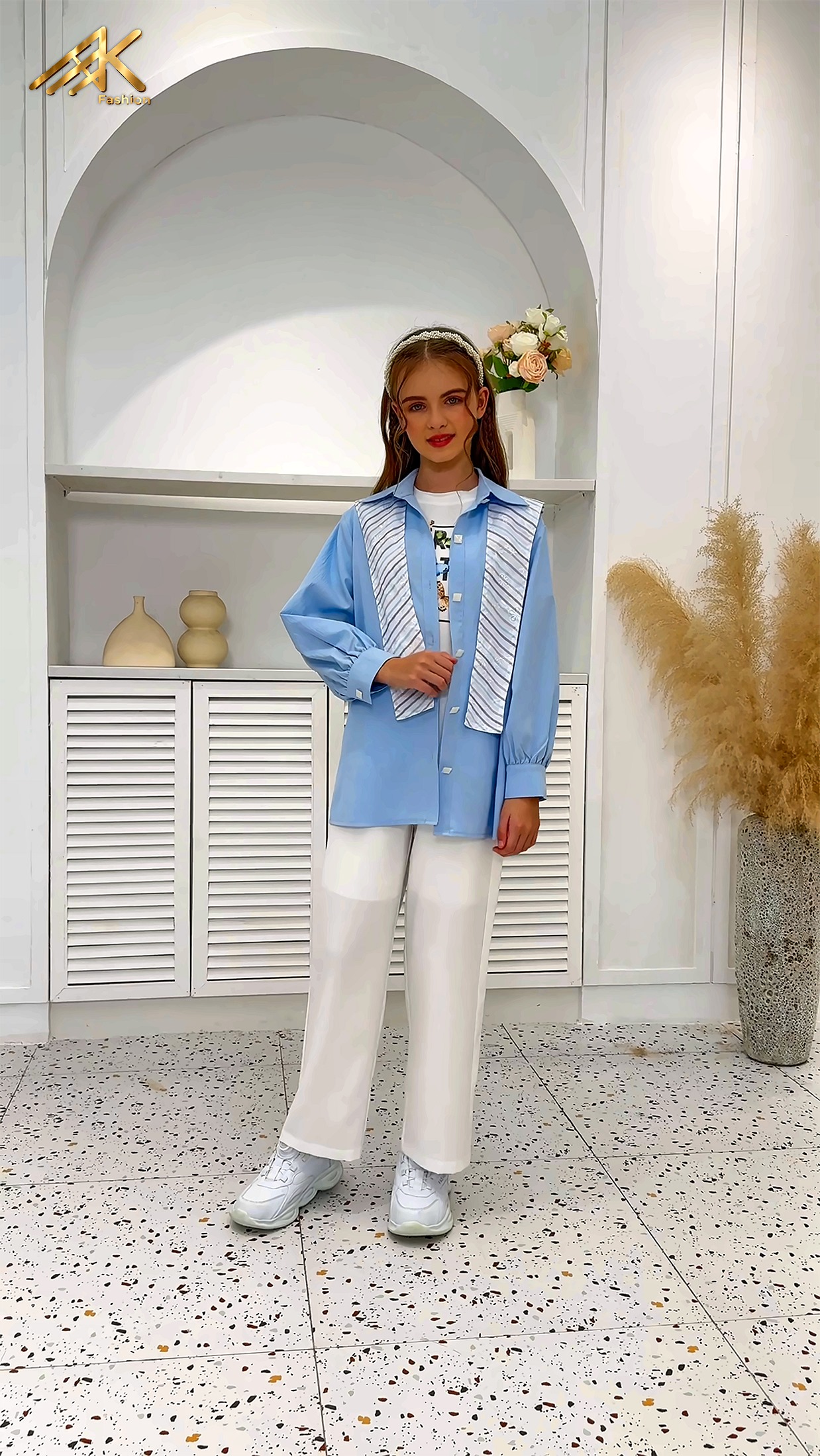 Light blue shirt with white wide-leg trousers