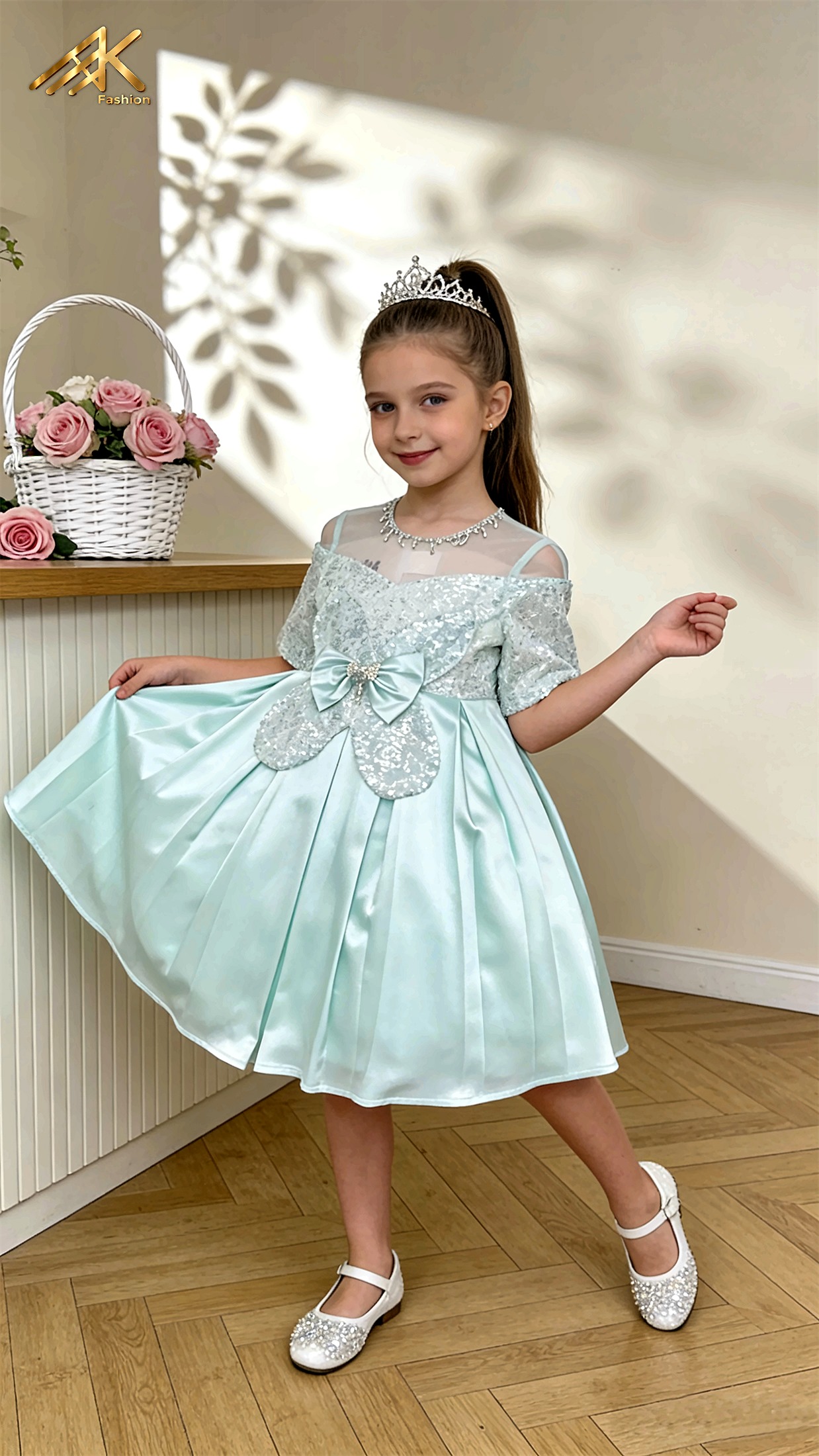 Girl wearing an AK Fashion mint sequin garden dress